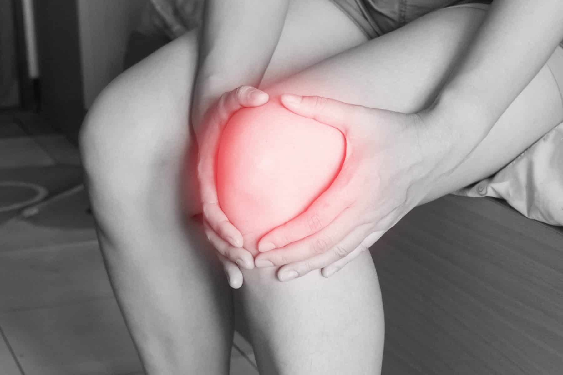 Careway patient holding their knee